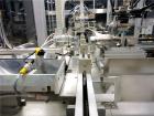 Used MGS Model TLC Top Load Cartoner with Robotic Pick and Place Unit