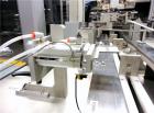 Used MGS Model TLC Top Load Cartoner with Robotic Pick and Place Unit