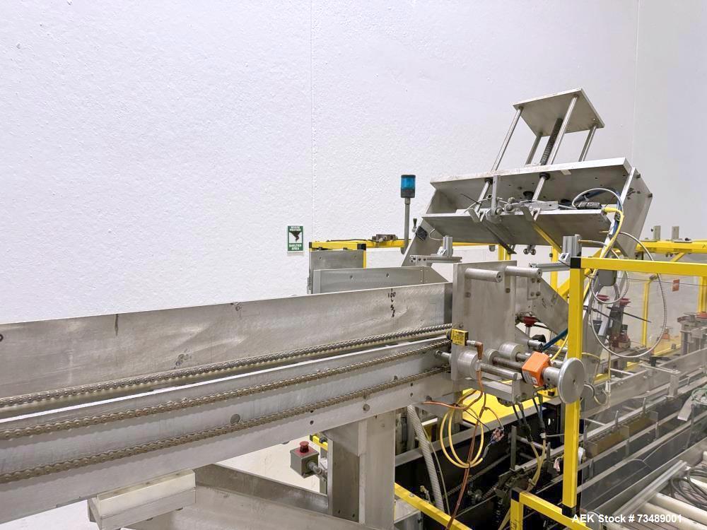 Used Adco Model 12LBC100-EC Automatic Horizontal Cartoner with Top Squaring for Large Width Cartons. Machine is capable of speeds up to 25 to 100 cartons per minute depending on carton size and appli...