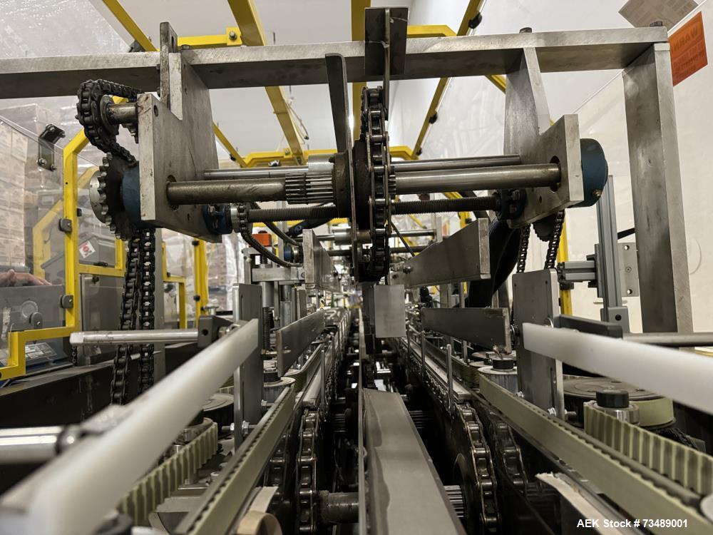 Used Adco Model 12LBC100-EC Automatic Horizontal Cartoner with Top Squaring for Large Width Cartons. Machine is capable of speeds up to 25 to 100 cartons per minute depending on carton size and appli...