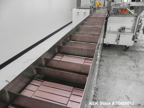 Used Adco Model 15DBC105-EC Automatic Horizontal Cartoner. Capable of speeds from 50 to 125 cartons per minute. Has two head rotary carton feed with 4' long magazine. Machine is set on 12" centers fo...