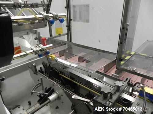 Used Adco Model 15DBC105-EC Automatic Horizontal Cartoner. Capable of speeds from 50 to 125 cartons per minute. Has two head rotary carton feed with 4' long magazine. Machine is set on 12" centers fo...