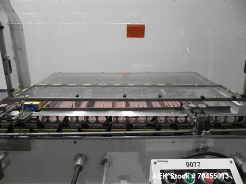 Used Adco Model 15DBC105-EC Automatic Horizontal Cartoner. Capable of speeds from 50 to 125 cartons per minute. Has two head rotary carton feed with 4' long magazine. Machine is set on 12" centers fo...