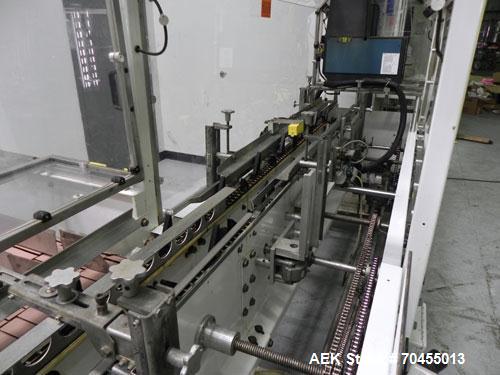 Used Adco Model 15DBC105-EC Automatic Horizontal Cartoner. Capable of speeds from 50 to 125 cartons per minute. Has two head rotary carton feed with 4' long magazine. Machine is set on 12" centers fo...