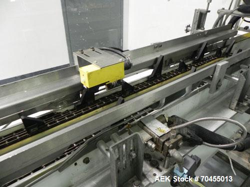 Used Adco Model 15DBC105-EC Automatic Horizontal Cartoner. Capable of speeds from 50 to 125 cartons per minute. Has two head rotary carton feed with 4' long magazine. Machine is set on 12" centers fo...
