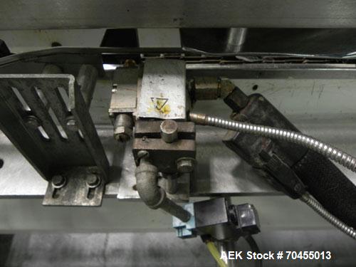 Used Adco Model 15DBC105-EC Automatic Horizontal Cartoner. Capable of speeds from 50 to 125 cartons per minute. Has two head rotary carton feed with 4' long magazine. Machine is set on 12" centers fo...