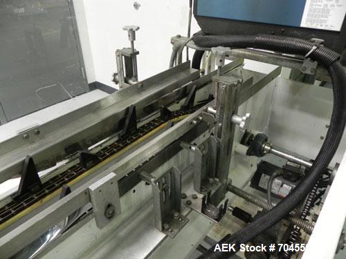 Used Adco Model 15DBC105-EC Automatic Horizontal Cartoner. Capable of speeds from 50 to 125 cartons per minute. Has two head rotary carton feed with 4' long magazine. Machine is set on 12" centers fo...