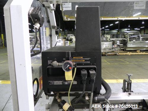 Used Adco Model 15DBC105-EC Automatic Horizontal Cartoner. Capable of speeds from 50 to 125 cartons per minute. Has two head rotary carton feed with 4' long magazine. Machine is set on 12" centers fo...