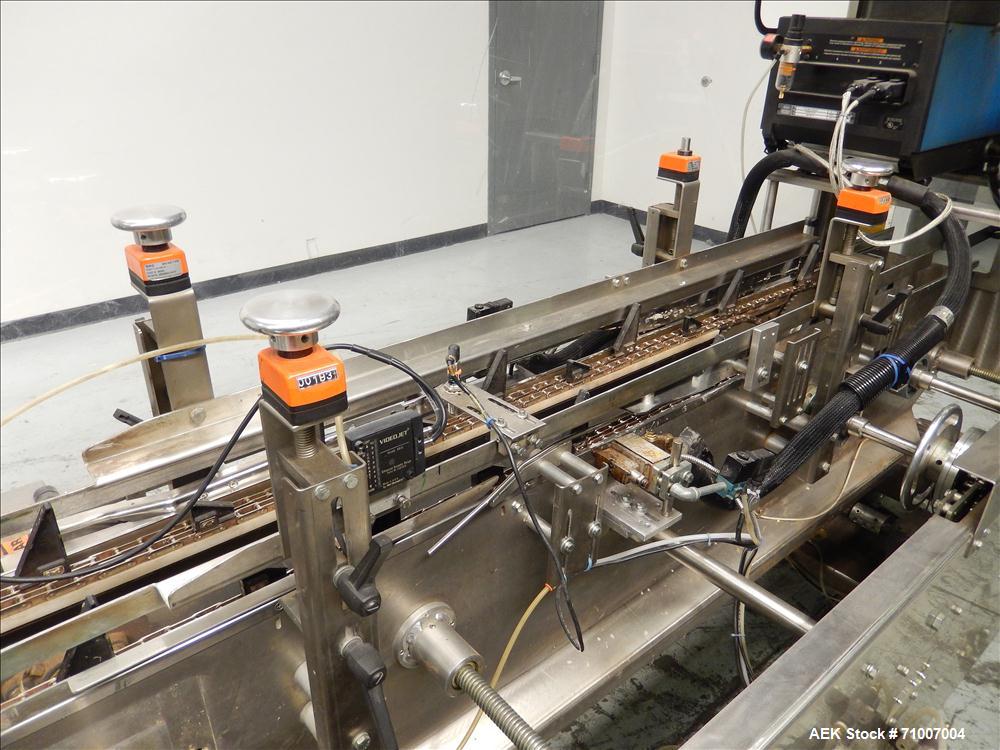 Used Adco Model 15DBC105-SS Horizontal Automatic Load Glue Cartoner.
