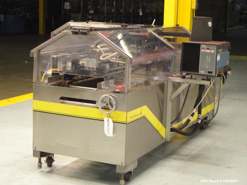 Used Econocorp Spartan Automatic Horizontal Glue Cartoner capable of speeds up to 40 cartons per minute. Has 12" centers for carton size range:  length 4" - 10" , width 1" - 4",  depth 8" (approx)  -...
