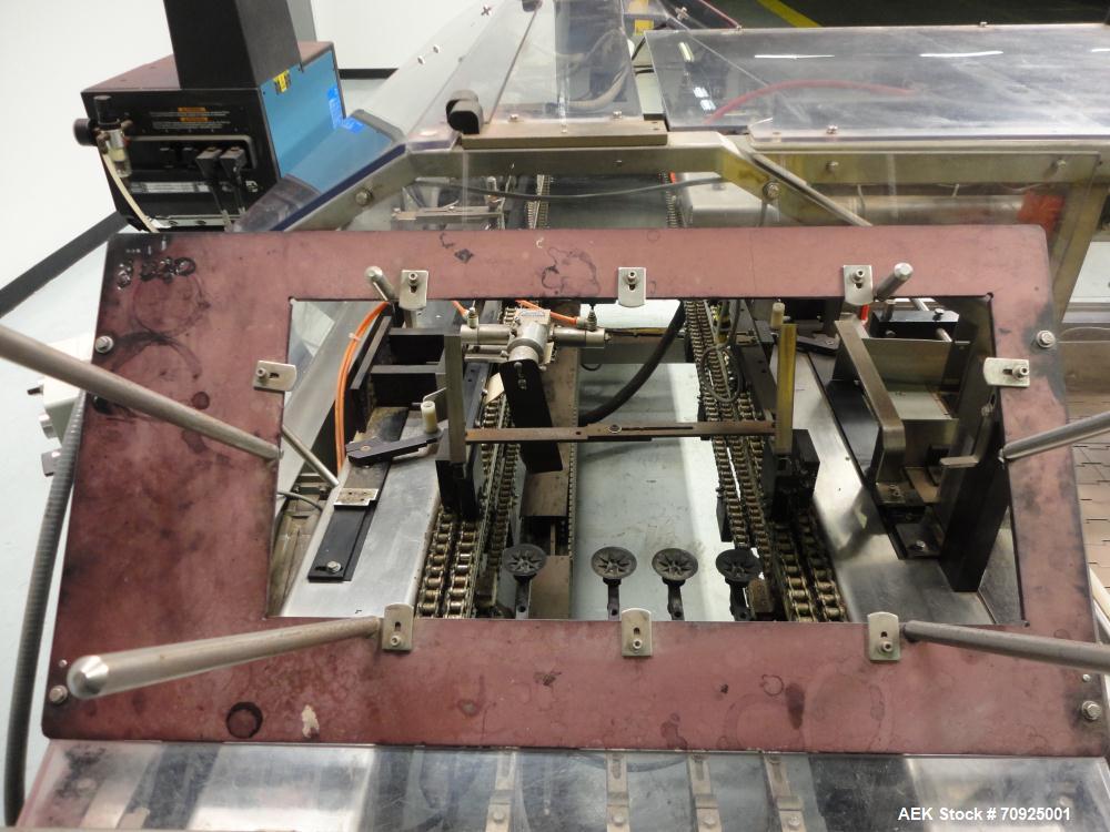 Used Econocorp Spartan Automatic Horizontal Glue Cartoner capable of speeds up to 40 cartons per minute. Has 12" centers for carton size range:  length 4" - 10" , width 1" - 4",  depth 8" (approx)  -...