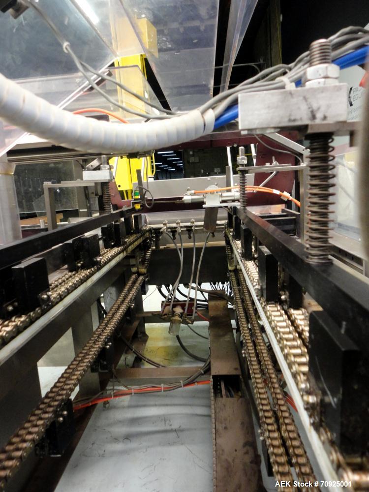 Used Econocorp Spartan Automatic Horizontal Glue Cartoner capable of speeds up to 40 cartons per minute. Has 12" centers for carton size range:  length 4" - 10" , width 1" - 4",  depth 8" (approx)  -...