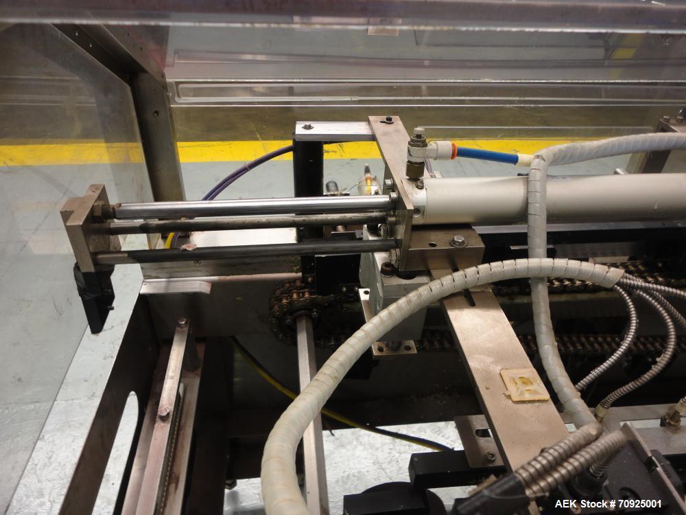 Used Econocorp Spartan Automatic Horizontal Glue Cartoner capable of speeds up to 40 cartons per minute. Has 12" centers for carton size range:  length 4" - 10" , width 1" - 4",  depth 8" (approx)  -...