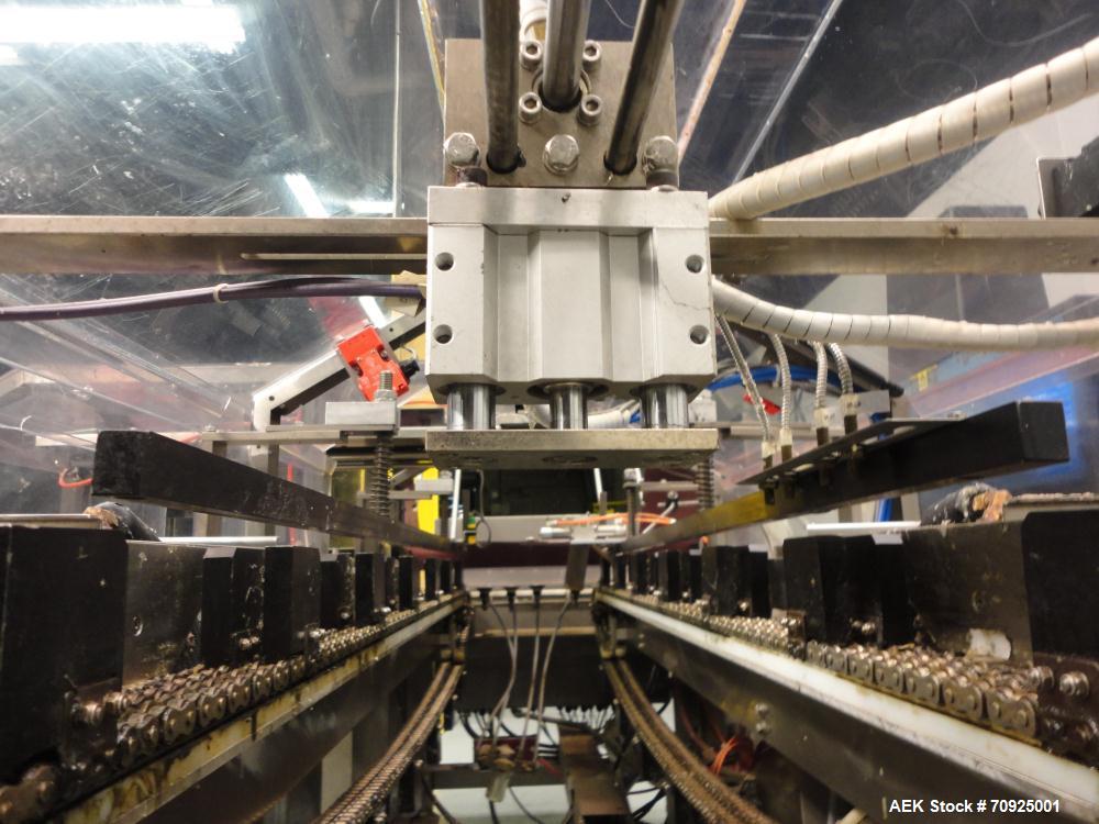 Used Econocorp Spartan Automatic Horizontal Glue Cartoner capable of speeds up to 40 cartons per minute. Has 12" centers for carton size range:  length 4" - 10" , width 1" - 4",  depth 8" (approx)  -...