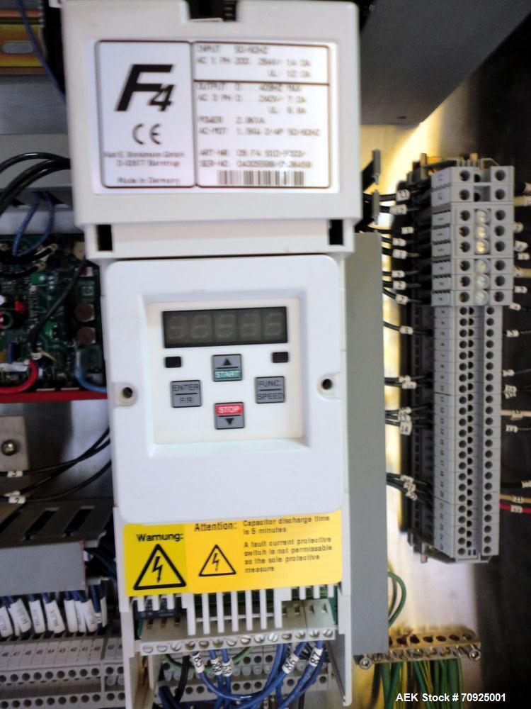 Used Econocorp Spartan Automatic Horizontal Glue Cartoner capable of speeds up to 40 cartons per minute. Has 12" centers for carton size range:  length 4" - 10" , width 1" - 4",  depth 8" (approx)  -...