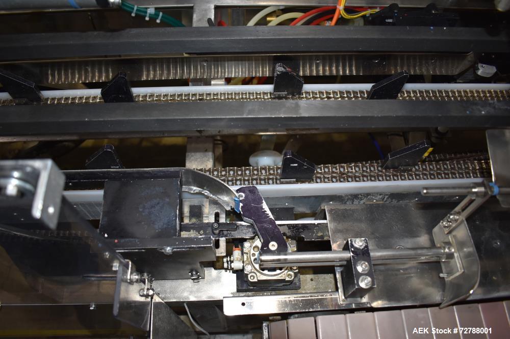 Used Econocorp Econoseal Spartan Automatic Horizontal Intermittent Hotmelt Glue Cartoner. Capable of speeds up to 40 cartons per minute (depending on carton style). Carton size range: 2" - 10" Length...