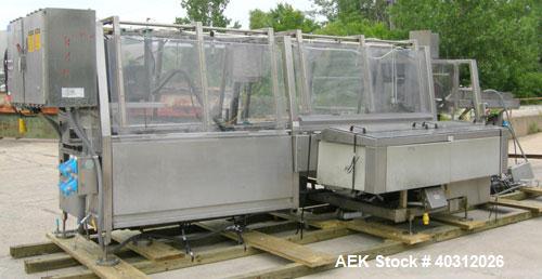 Used Kliklok Captain H Horizontal Automatic Cartoner, model HS-11198, stainless steel construction. Approximately over 150 cartons per minute, size range 2" to 7" long x 1 1/2" to 3" wide x 4" to 10"...