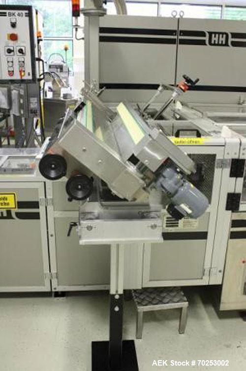 Used Harro Hofliger BK40-6" Cartoning Machine, equipped with a hot glue closing system. Minimum carton size 1.97" x 0.79" x 5.5" (50 x 20 x 140 mm), maximum carton size 4.72" x 3.94" x 7.87" (120 x 1...