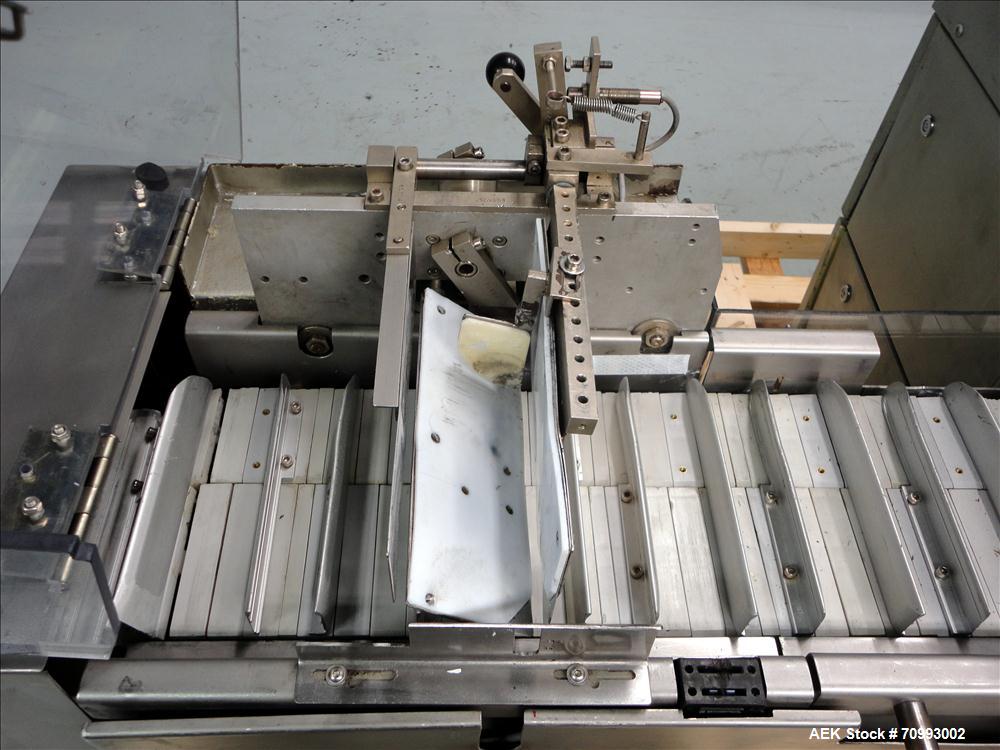 Used IWKA Model CP150 Automatic Horizontal Tube Cartoner. Capable of speeds up to 150 cartons per minute. Carton size: (Length) 20mm-90mm, (Width) 15mm-60mm, (Depth) 55mm-180mm. Set up for Reverse tu...