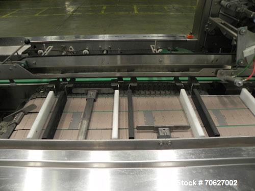 Used Kliklok (Woodman) Model SFR Automatic Horizontal Cartoner capable of speeds from 30 to 120 cartons per minute. 12" centers for a carton size range: Length - 2" to 10.2" or 50 mm to 260 mm, Width...