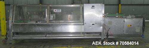 Used Kliklok (Woodman) Model SFR Automatic Horizontal Cartoner. Capable of speeds from 30 to 120 cartons per minute. Unit set on 15" centers for a carton size range: length 2.16" to 12.5" 55mm-318mm,...