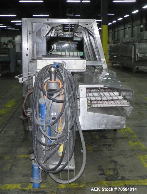 Used Kliklok (Woodman) Model SFR Automatic Horizontal Cartoner. Capable of speeds from 30 to 120 cartons per minute. Unit set on 15" centers for a carton size range: length 2.16" to 12.5" 55mm-318mm,...