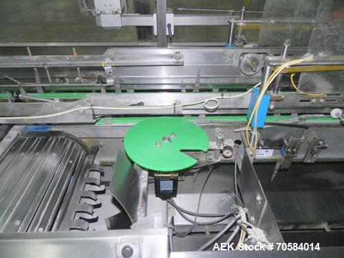 Used Kliklok (Woodman) Model SFR Automatic Horizontal Cartoner. Capable of speeds from 30 to 120 cartons per minute. Unit set on 15" centers for a carton size range: length 2.16" to 12.5" 55mm-318mm,...