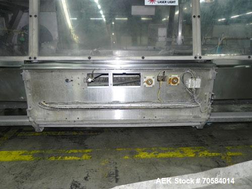 Used Kliklok (Woodman) Model SFR Automatic Horizontal Cartoner. Capable of speeds from 30 to 120 cartons per minute. Unit set on 15" centers for a carton size range: length 2.16" to 12.5" 55mm-318mm,...