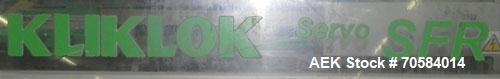 Used Kliklok (Woodman) Model SFR Automatic Horizontal Cartoner. Capable of speeds from 30 to 120 cartons per minute. Unit set on 15" centers for a carton size range: length 2.16" to 12.5" 55mm-318mm,...