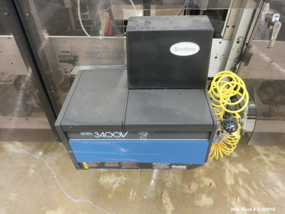 Used Langen MC-SCA Automatic Horizontal Cartoner with 9" centers Nordson Hot Me