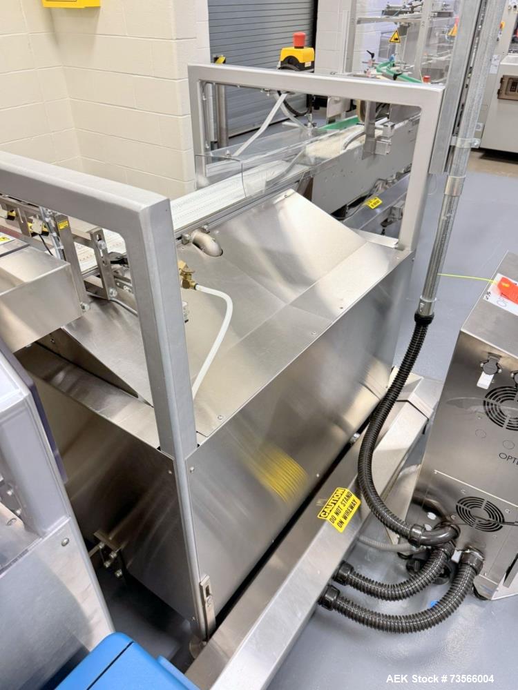 Used MGS Machine Stealth Horizontal Continuous Motion Cartoner, Serial# 14127, Year 2010. With Allen-Bradley PanelView Plus 1000, Nordson glue unit, panel & assorted parts.