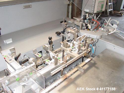 Used Marchesini Horizontal Cartoner, model BA100. Machine is capable of speeds up to 120 cpm. Horizontal intermittant motion cartoner set up for glue style cartons with embosse date coder and automat...