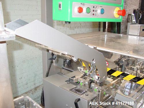 Used Marchesini Horizontal Cartoner, model BA100. Machine is capable of speeds up to 120 cpm. Horizontal intermittant motion cartoner set up for glue style cartons with embosse date coder and automat...