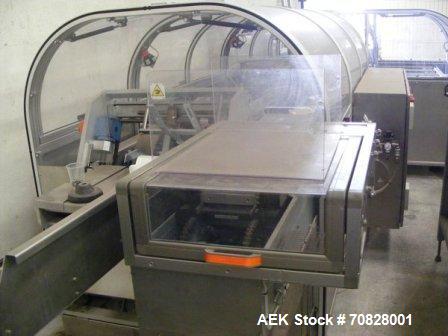 Used Rama RM A2C Horizontal Cartoner.  Maximum box size 11.8" x 11.8" x 2.7" (300 x 300 x 70 mm).  Minimum box size 4.7" x 3.9" x 0.7" (120 x 100 x 20 mm).  With rotary carton feeder.  (1) Control pa...