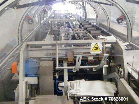 Used Rama RM A2C Horizontal Cartoner.  Maximum box size 11.8" x 11.8" x 2.7" (300 x 300 x 70 mm).  Minimum box size 4.7" x 3.9" x 0.7" (120 x 100 x 20 mm).  With rotary carton feeder.  (1) Control pa...