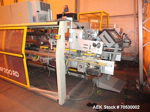 Used SMI Cardboard Sleeve Multipacker, Model MP200 RD.200 Packs/minute; fully automatic; can pack plastic, metal or glass containers in overwrapping cardboard sleeves; can be packed in OTT (Over The ...