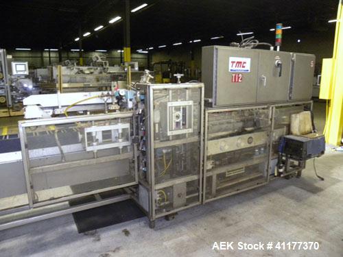 Used Tisma Automatic Horizontal Glue Cartoner, Model 600-SE. Capable of speeds over 200 CPM. Has 5" centers for a carton size range: length 1" to 4-1/4", depth 3" to 7", width 1/2" to 3". Has four he...