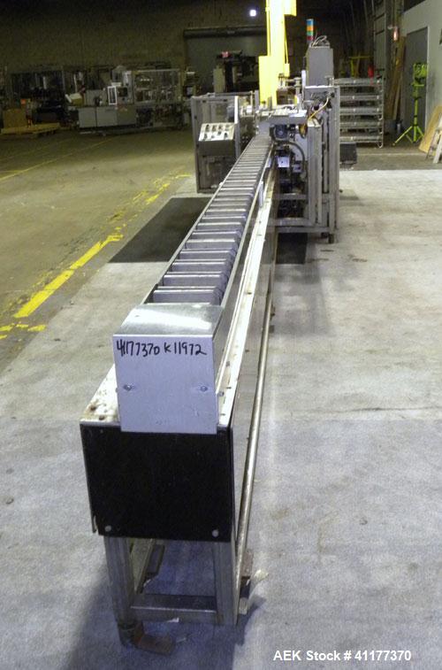 Used Tisma Automatic Horizontal Glue Cartoner, Model 600-SE. Capable of speeds over 200 CPM. Has 5" centers for a carton size range: length 1" to 4-1/4", depth 3" to 7", width 1/2" to 3". Has four he...