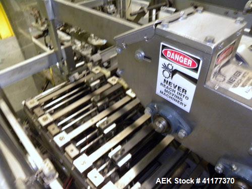 Used Tisma Automatic Horizontal Glue Cartoner, Model 600-SE. Capable of speeds over 200 CPM. Has 5" centers for a carton size range: length 1" to 4-1/4", depth 3" to 7", width 1/2" to 3". Has four he...