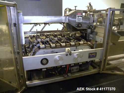 Used Tisma Automatic Horizontal Glue Cartoner, Model 600-SE. Capable of speeds over 200 CPM. Has 5" centers for a carton size range: length 1" to 4-1/4", depth 3" to 7", width 1/2" to 3". Has four he...