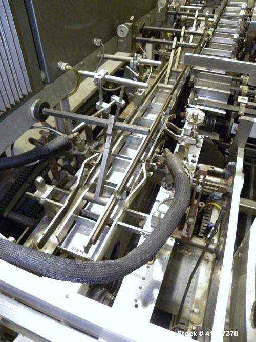 Used Tisma Automatic Horizontal Glue Cartoner, Model 600-SE. Capable of speeds over 200 CPM. Has 5" centers for a carton size range: length 1" to 4-1/4", depth 3" to 7", width 1/2" to 3". Has four he...