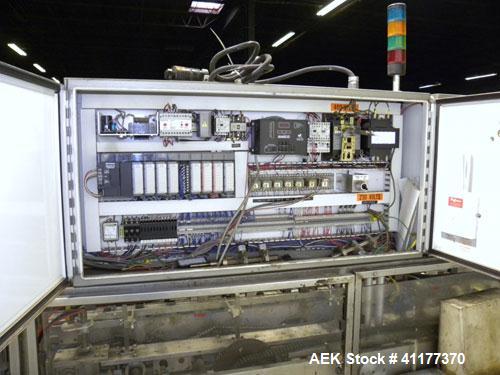 Used Tisma Automatic Horizontal Glue Cartoner, Model 600-SE. Capable of speeds over 200 CPM. Has 5" centers for a carton size range: length 1" to 4-1/4", depth 3" to 7", width 1/2" to 3". Has four he...