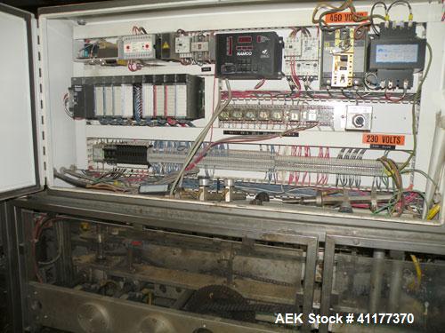 Used Tisma Automatic Horizontal Glue Cartoner, Model 600-SE. Capable of speeds over 200 CPM. Has 5" centers for a carton size range: length 1" to 4-1/4", depth 3" to 7", width 1/2" to 3". Has four he...