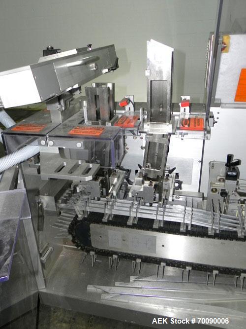 Used Uhlmann Model C2205 Automatic Blister Cartoner. Capable of speeds up to 250 cartons per minute. Has a 5" pitch for a maximum carton size range: length 150mm, width 100mm, height 90mm. Max number...