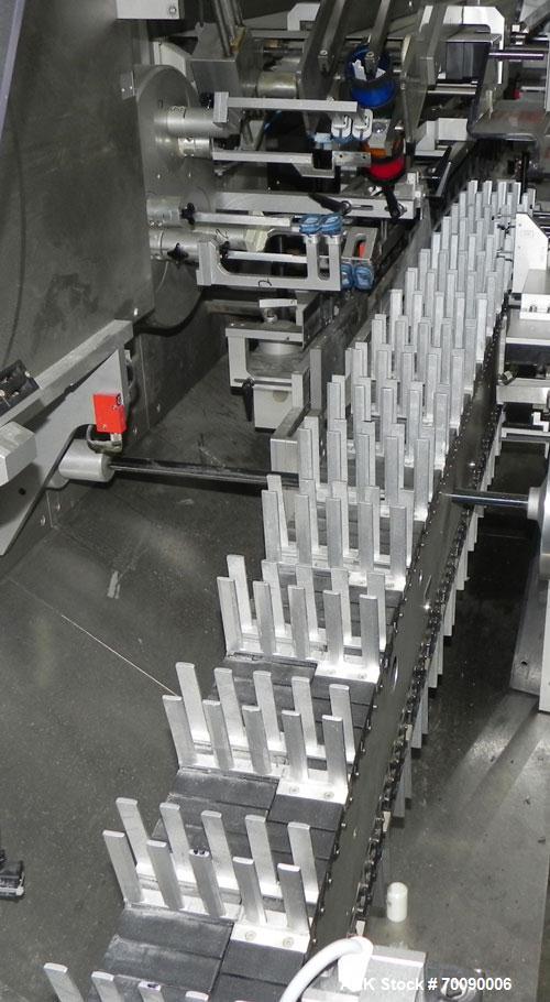 Used Uhlmann Model C2205 Automatic Blister Cartoner. Capable of speeds up to 250 cartons per minute. Has a 5" pitch for a maximum carton size range: length 150mm, width 100mm, height 90mm. Max number...