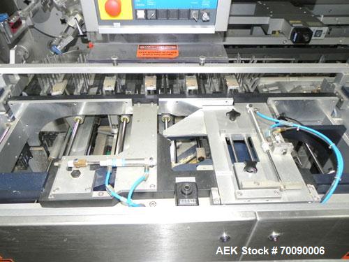 Used Uhlmann Model C2205 Automatic Blister Cartoner. Capable of speeds up to 250 cartons per minute. Has a 5" pitch for a maximum carton size range: length 150mm, width 100mm, height 90mm. Max number...