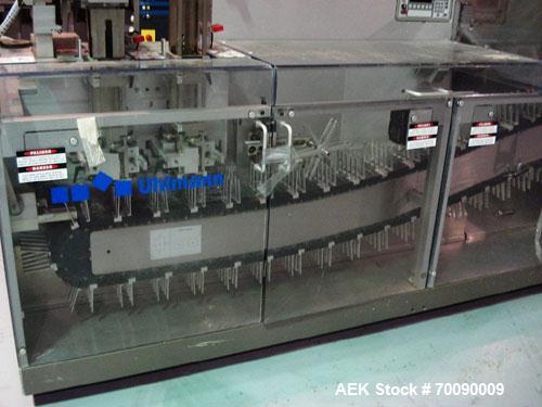 Used Uhlmann Model C2205 automatic blister cartoner. Capable of speeds up to 250 cartons per minute. Has a 5" pitch for a Maximum carton size range: (Length) 150mm (Width) 100mm (Height) 90mm. Max nu...