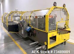 Used Adco Model 12LBC100-EC Automatic Horizontal Cartoner with Top Squaring for Large Width Cartons. Machine is capable of s...
