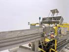Used Adco Model 12LBC100-EC Automatic Horizontal Cartoner with Top Squaring for Large Width Cartons. Machine is capable of speeds up to 25 to 100 cartons per minute depending on carton size and appli...