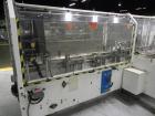 Used Adco Model 15DBC105-EC Automatic Horizontal Cartoner. Capable of speeds from 50 to 125 cartons per minute. Has two head rotary carton feed with 4' long magazine. Machine is set on 12